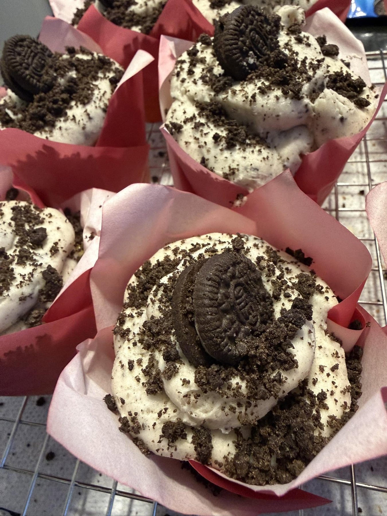 Cookies-and-cream cupcakes topped with whole sandwich cookies